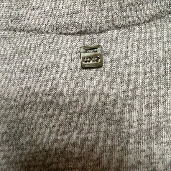 Lolë size medium button down sleeveless sweater . Like new - Picture 4 of 5